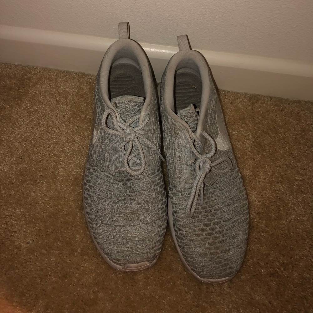 Gray Nike running shoes